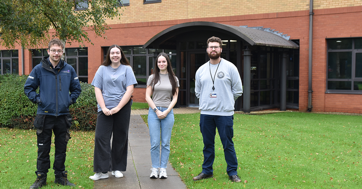 Campden BRI apprentices standing in front of reception at Campden BRIs head office