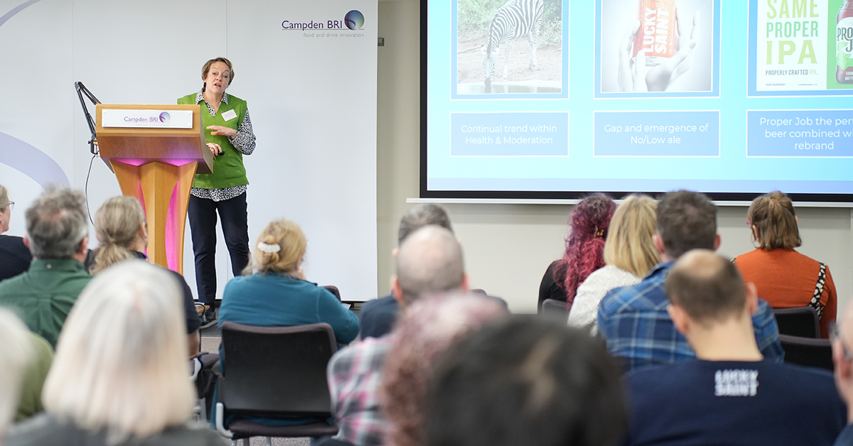 External speaker on stage presenting at the Brewers' Day 2025 event held at Campden BRI