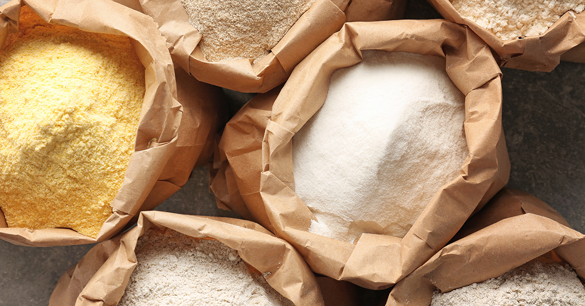 Selection of different flour types in brown sacks