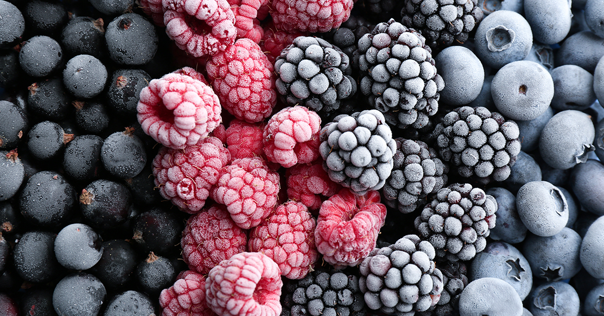 Close up of frozen fruits with thin layer of frost