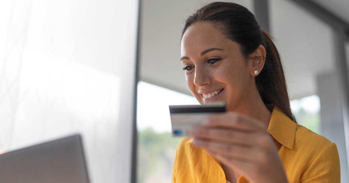 Woman making a purchase online using a credit card